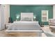 Bright bedroom with a queen bed, and neutral color scheme at 3047 E Fremont Rd, Phoenix, AZ 85042