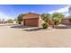 Attached garage with driveway and desert landscaping at 3047 E Fremont Rd, Phoenix, AZ 85042
