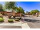 Encanto community entrance with gated access and landscaping at 3047 E Fremont Rd, Phoenix, AZ 85042
