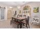 Dining area with wooden table, bench and chairs at 3047 E Fremont Rd, Phoenix, AZ 85042