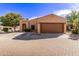 Single story home with two-car garage and desert landscaping at 3047 E Fremont Rd, Phoenix, AZ 85042