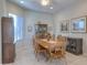 Formal dining room with wood table and chairs, and built-in hutch at 27552 W Tonopah Dr, Buckeye, AZ 85396