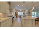 Open kitchen with large island and stainless steel appliances at 27552 W Tonopah Dr, Buckeye, AZ 85396