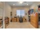 Bright home office features built-in shelving and ample desk space at 27552 W Tonopah Dr, Buckeye, AZ 85396