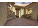 Inviting courtyard entry with sitting area and decorative wreath at 27552 W Tonopah Dr, Buckeye, AZ 85396