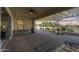 Covered patio with brick flooring and fountain at 27552 W Tonopah Dr, Buckeye, AZ 85396