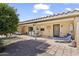 Large patio with multiple seating areas and backyard access at 4019 E Calypso Ave, Mesa, AZ 85206