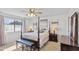 Spacious bedroom with a post bed and ample natural light at 4019 E Calypso Ave, Mesa, AZ 85206
