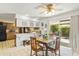 Bright dining area with a view of the backyard and kitchen at 4019 E Calypso Ave, Mesa, AZ 85206