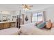 Bright bedroom featuring a comfortable bed and built-in dresser at 4019 E Calypso Ave, Mesa, AZ 85206