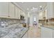 Elegant kitchen boasting granite countertops and custom cabinetry at 4645 N 65Th St, Scottsdale, AZ 85251