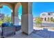 Covered porch with seating area overlooking the neighborhood at 9515 E Rainbow Ave, Mesa, AZ 85212
