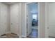 Clean hallway with access to office and other rooms at 9515 E Rainbow Ave, Mesa, AZ 85212