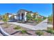 Landscaped home exterior with a walkway and driveway at 9515 E Rainbow Ave, Mesa, AZ 85212