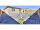 Small backyard with artificial turf and gravel at 9515 E Rainbow Ave, Mesa, AZ 85212