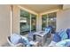Relaxing covered patio with seating area and view of backyard at 9515 E Rainbow Ave, Mesa, AZ 85212