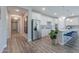Modern kitchen with white cabinets, stainless steel appliances, and an island at 9515 E Rainbow Ave, Mesa, AZ 85212