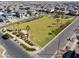 Community park with grassy area, playground, and palm trees at 9515 E Rainbow Ave, Mesa, AZ 85212