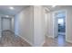 Bright hallway with access to multiple rooms at 9515 E Rainbow Ave, Mesa, AZ 85212