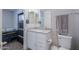 Clean bathroom with granite countertop and white cabinets at 9515 E Rainbow Ave, Mesa, AZ 85212