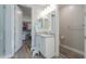 Simple bathroom with single vanity and walk-in shower at 9515 E Rainbow Ave, Mesa, AZ 85212