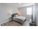 Bright bedroom featuring wood flooring and ample natural light at 9515 E Rainbow Ave, Mesa, AZ 85212