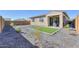 Backyard with artificial turf and gravel at 9515 E Rainbow Ave, Mesa, AZ 85212