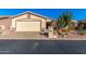 Charming single story home with desert landscaping and two-car garage at 2101 S Meridian Rd # 172, Apache Junction, AZ 85120