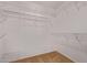 Large walk-in closet with wire shelving and carpeting at 2101 S Meridian Rd # 172, Apache Junction, AZ 85120