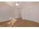 Spacious bedroom with double door closet and ceiling fan at 2101 S Meridian Rd # 172, Apache Junction, AZ 85120