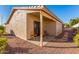 Small patio area with two chairs and a view of the backyard at 2101 S Meridian Rd # 172, Apache Junction, AZ 85120