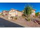 Front view of a charming house with xeriscaping in the front yard at 2101 S Meridian Rd # 172, Apache Junction, AZ 85120