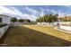 Spacious backyard with grassy area and walkway at 22474 S 199Th Cir, Queen Creek, AZ 85142
