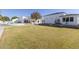 Large backyard with grassy lawn and home views at 22474 S 199Th Cir, Queen Creek, AZ 85142