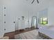 Charming bedroom with a dresser and full-length mirror at 22474 S 199Th Cir, Queen Creek, AZ 85142
