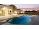 Stunning freeform pool with diving board and expansive patio at 22474 S 199Th Cir, Queen Creek, AZ 85142