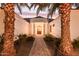 Stunning curb appeal! This home features a welcoming entryway and nicely landscaped grounds at 22474 S 199Th Cir, Queen Creek, AZ 85142