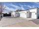 Three-car garage with modern finishes and ample parking space at 22474 S 199Th Cir, Queen Creek, AZ 85142