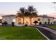 Luxury home with palm trees and a walkway at 22474 S 199Th Cir, Queen Creek, AZ 85142