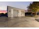 Modern garage with automatic door and window inserts at 22474 S 199Th Cir, Queen Creek, AZ 85142