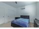 Bedroom with a double bed and built-in closet at 22474 S 199Th Cir, Queen Creek, AZ 85142