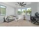 Home office with a comfortable couch and desk area at 22474 S 199Th Cir, Queen Creek, AZ 85142