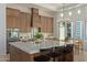 Gourmet kitchen with large island, custom cabinetry, and high-end appliances at 22474 S 199Th Cir, Queen Creek, AZ 85142