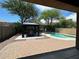 Relaxing backyard oasis with a pool and gazebo at 4512 W Stoneman Dr, Anthem, AZ 85086
