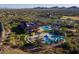 Resort-style pool and clubhouse with tennis courts at 4512 W Stoneman Dr, Anthem, AZ 85086