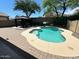 Freeform pool with brick patio and gazebo at 4512 W Stoneman Dr, Anthem, AZ 85086