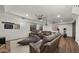 Finished basement with leather seating, media setup and home gym at 6429 S Honor Ct, Gilbert, AZ 85298