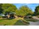 Home with mature trees and a landscaped lawn at 6429 S Honor Ct, Gilbert, AZ 85298