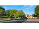 House with lush landscaping, a walkway and driveway at 6429 S Honor Ct, Gilbert, AZ 85298