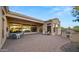 Spacious patio with string lights, outdoor furniture and a grill at 6429 S Honor Ct, Gilbert, AZ 85298